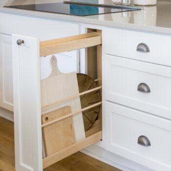Dura Supreme pull-out cabinet pan & tray storage.